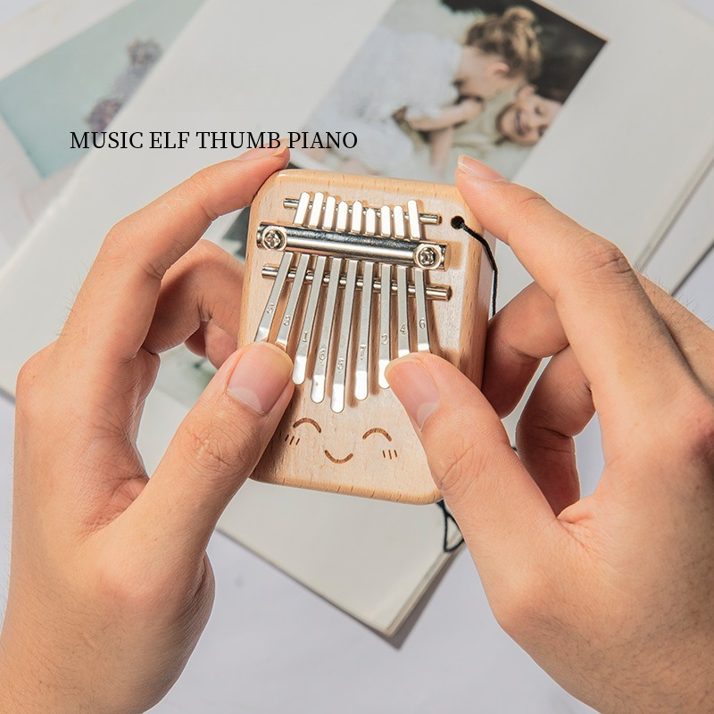 Solid Wood 9-tone Mini Thumb P - Musical Instrument Kalimba recension och pris