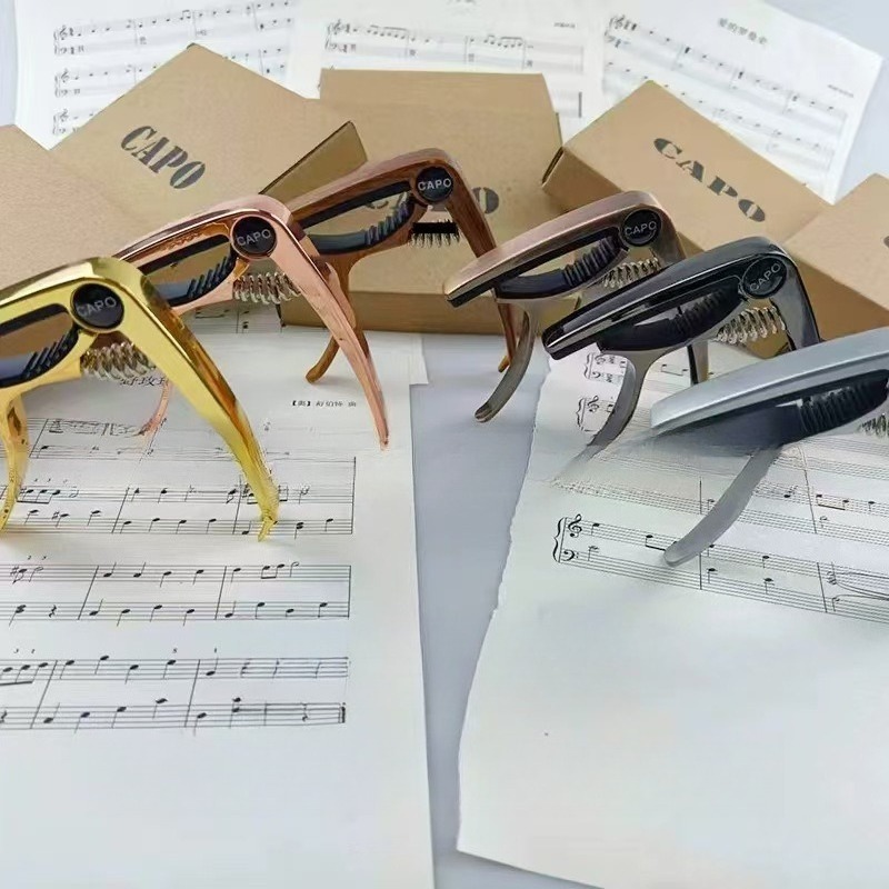 Musical Instrument Guitar Capo - Musical Instrument Ending In A recension och pris