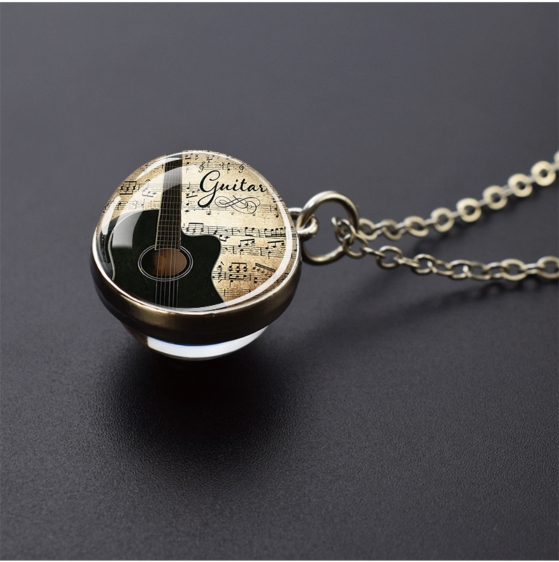 Musical Instrument Necklaces P - Musical Instrument Glass recension och pris